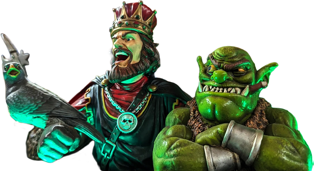 Fantasy figurines of a crowned man holding a bird and a green muscular orc with crossed arms.