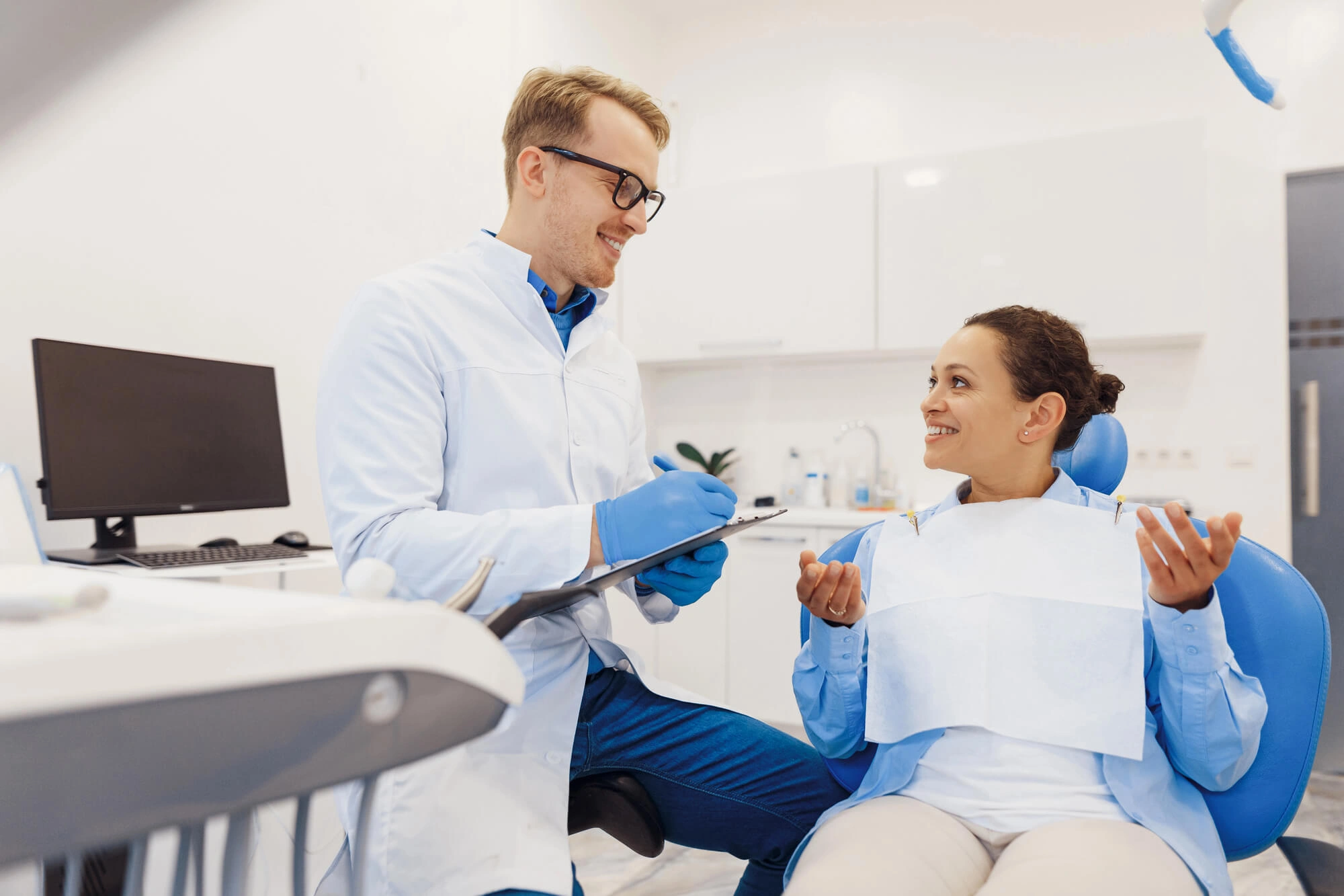 gentle dentist lansdale pa talking to a patient