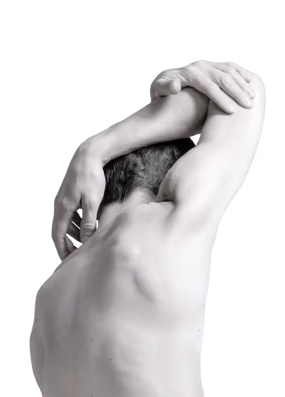 Black and white photo of a shirtless man with arms raised and hands clasped behind his head, showing his back muscles.