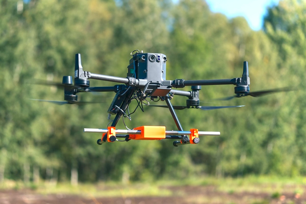 image of drone surveying crops