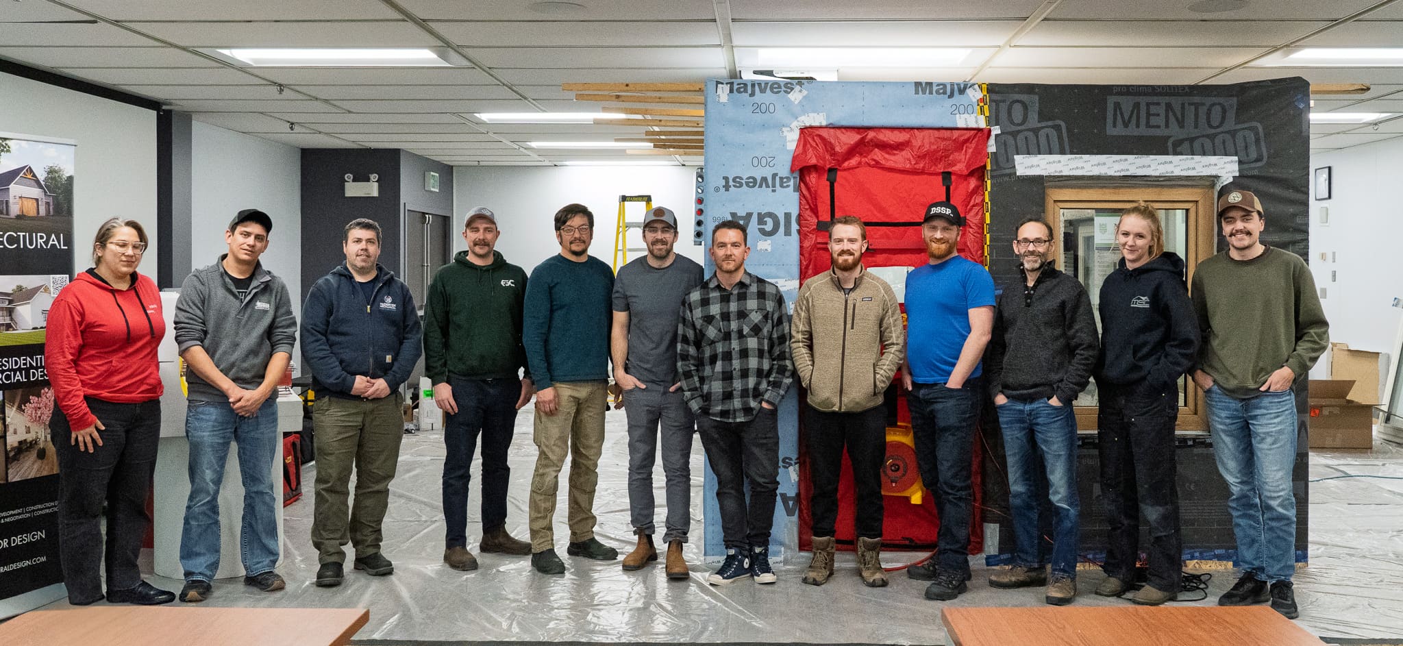 A group of participants taking part in the Certified Passive House Tradesperson course hosted by PlusBuild in collaboration with Wilson Architectural Design, Peel Passive House, Point Engineering, Quantum, and Retrofit. 