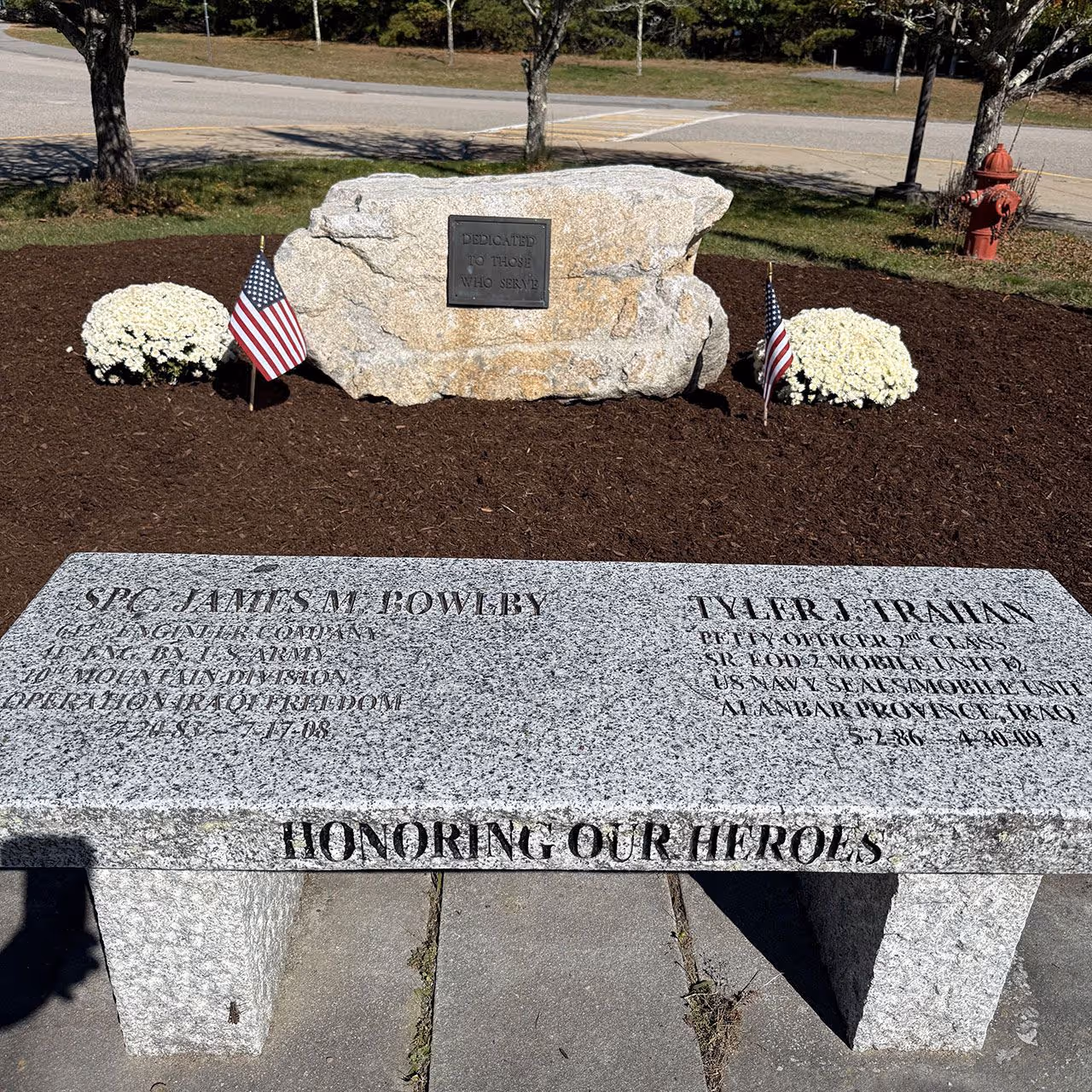 Freshly installed mulch enhancing landscape beds in Lakeville MA