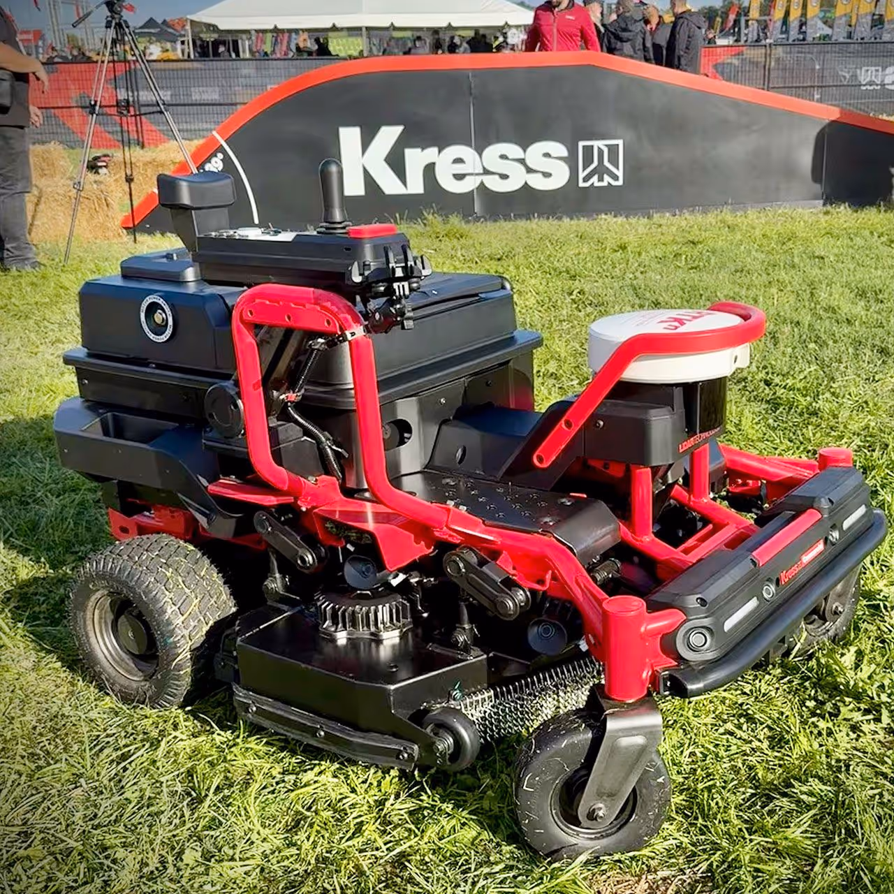 Commercial lawn mower creating clean, even grass stripes