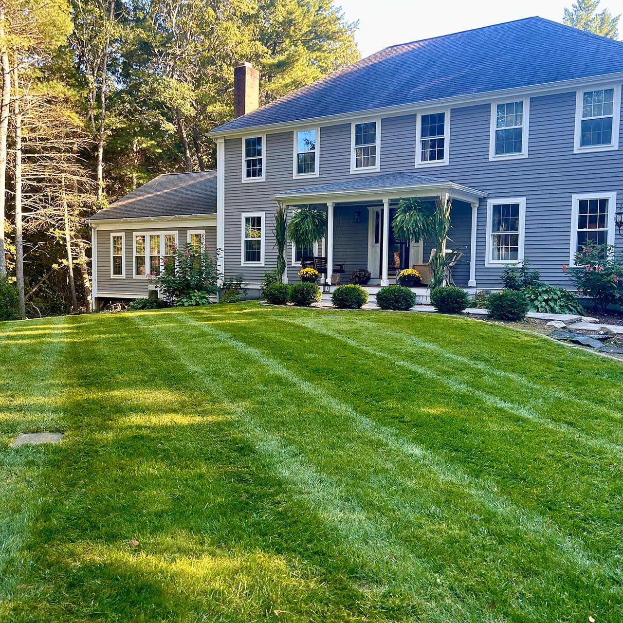 Professional lawn mowing service in Lakeville MA by LaMere Landscaping