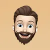 Cartoon avatar of a smiling man with brown hair and beard wearing wireless earbuds.