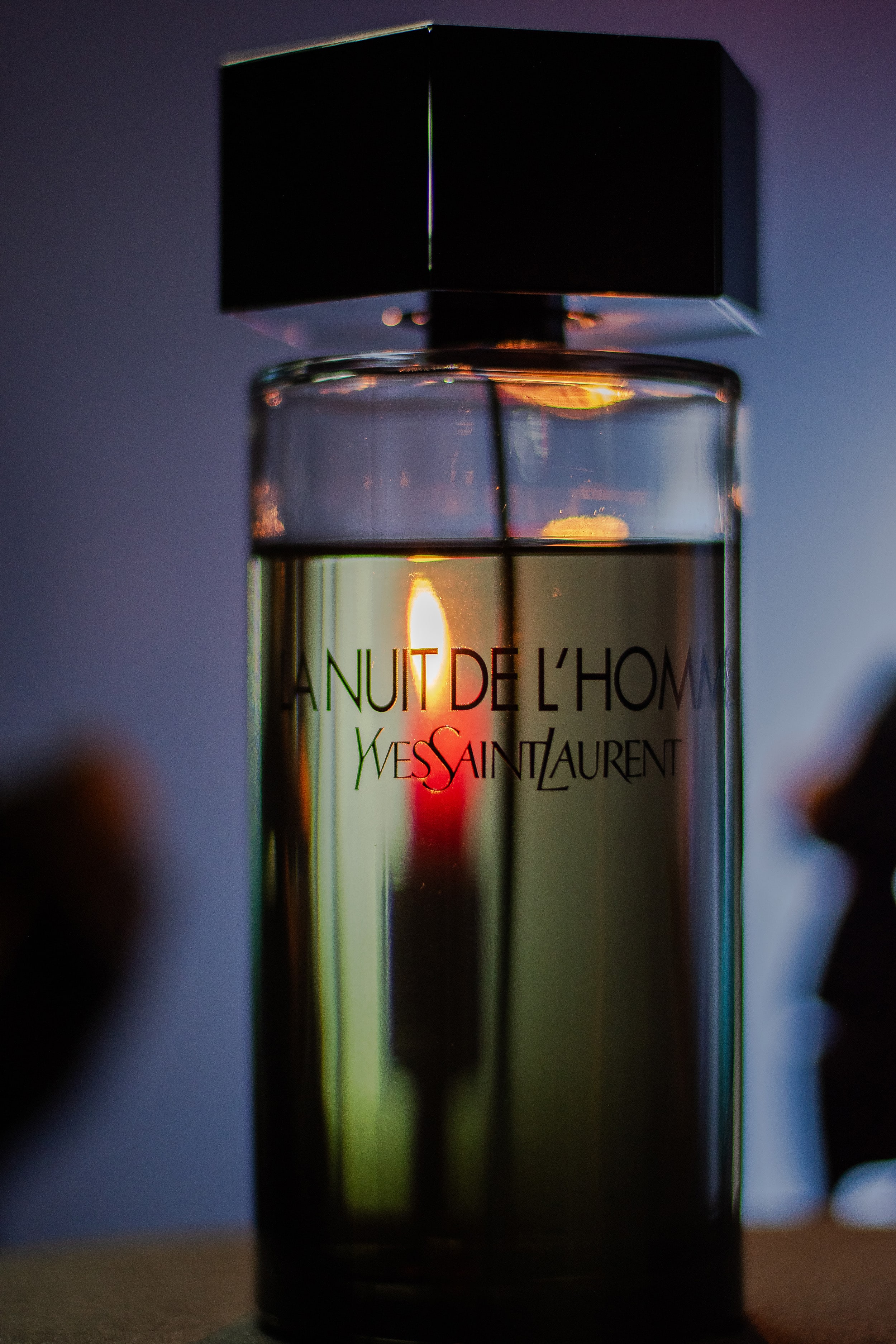 Close-up of La Nuit de L’Homme with soft white lighting for cinematic emphasis.