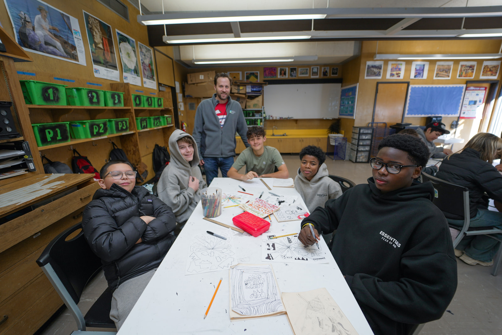 Group of boys in class with an educator