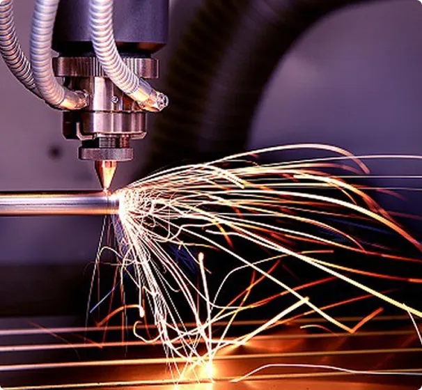 A piece of metal being worked on by a machine.