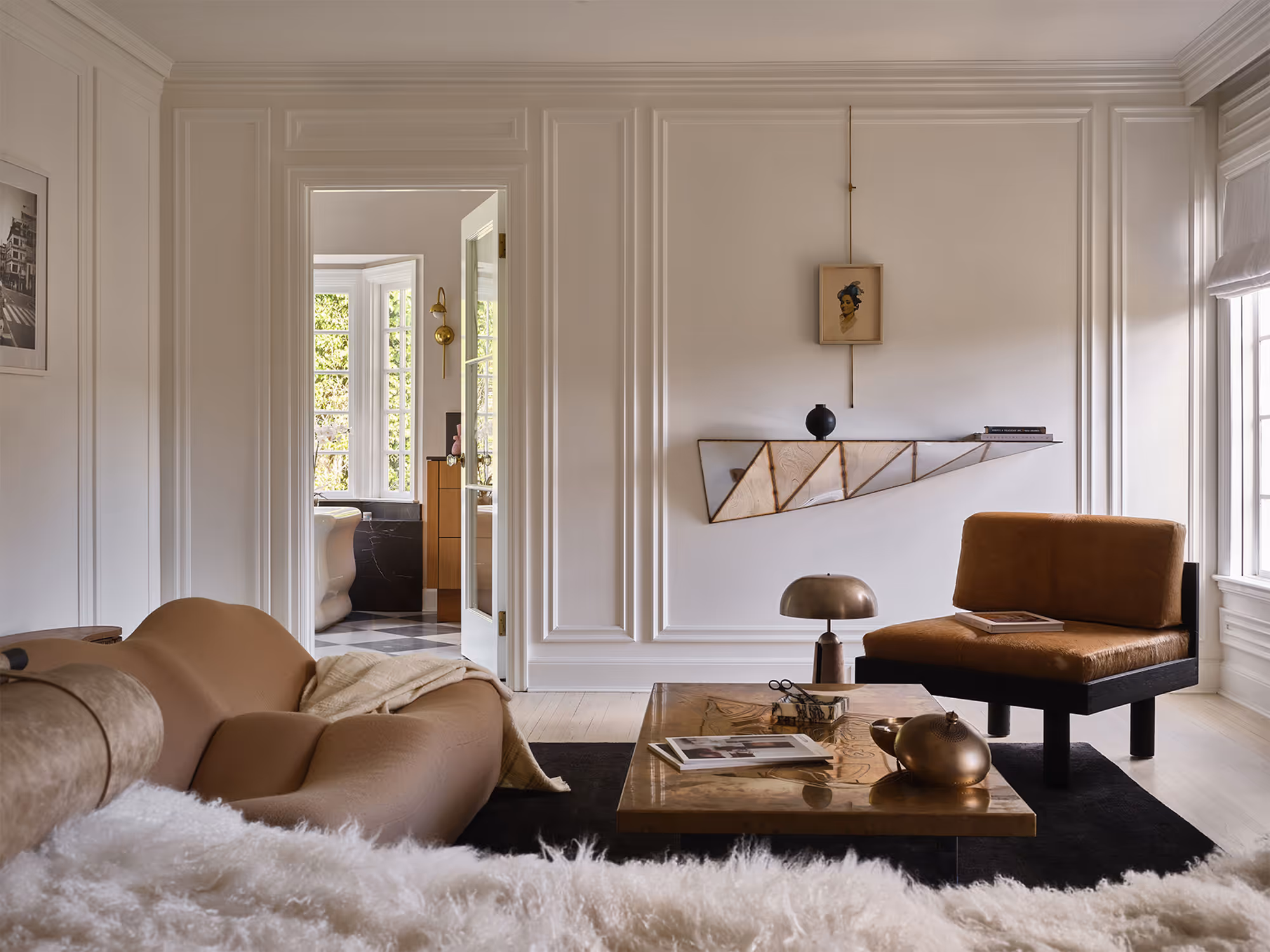 Elegant modern living room in Hancock Park, CA, featuring minimalist furniture and soft textures.