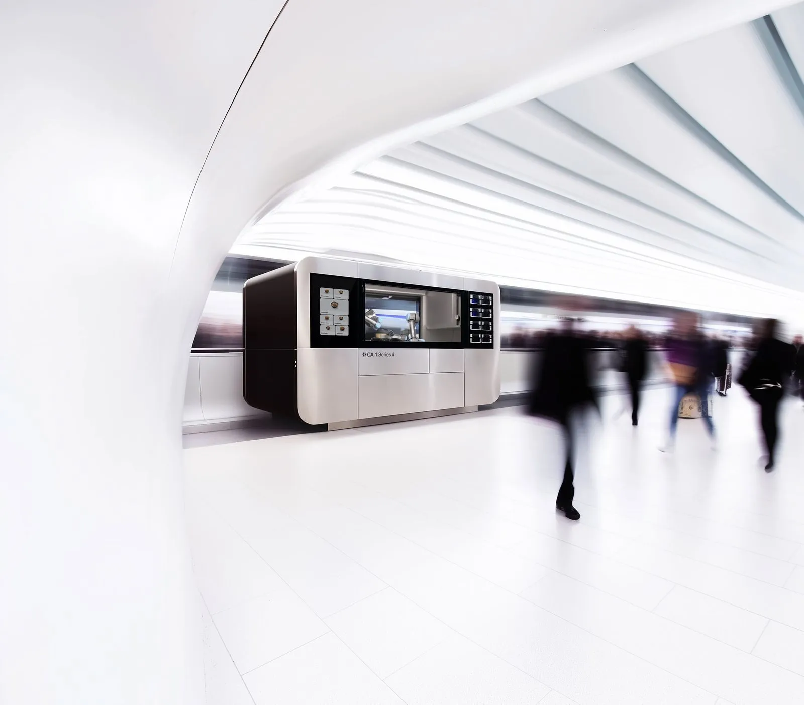 CA-I Series 4 robotic kitchen by CIRCUS Group operating in a modern dark environment, showcasing dual robotic arms, touchscreen meal selection, and integrated storage modules.