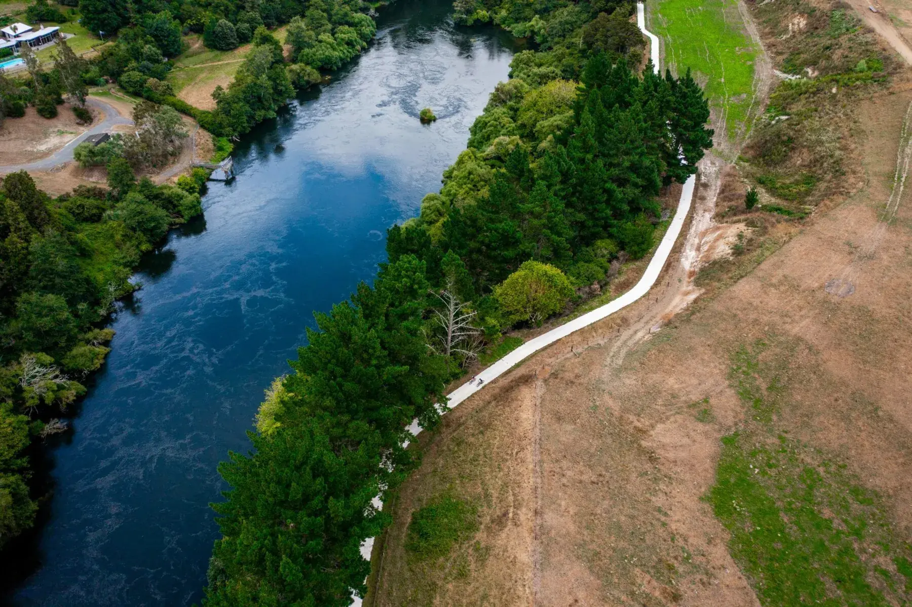 People cycling Te Awa River Trail