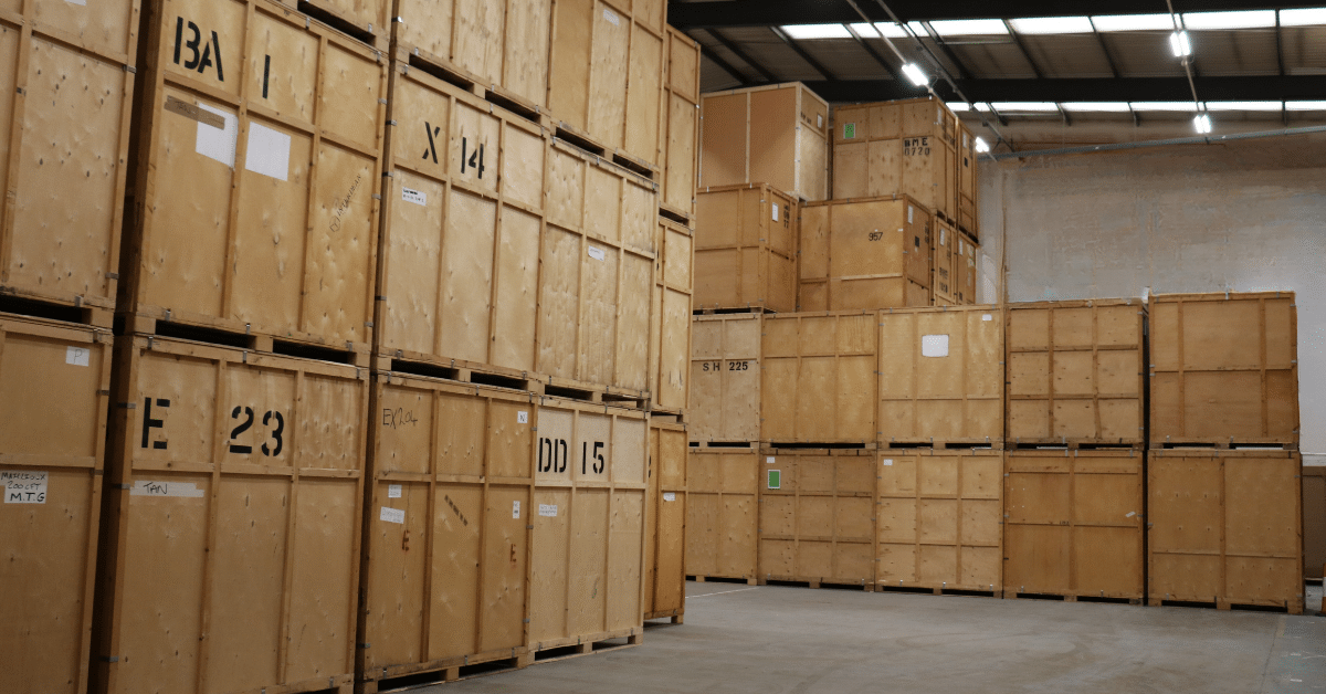 Stacks of large wooden storage crates.