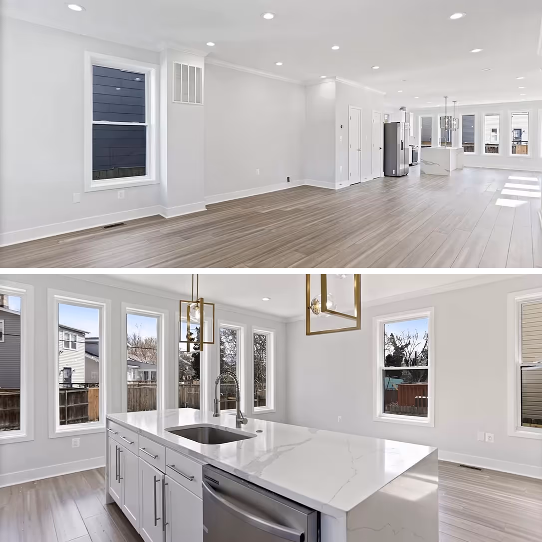 Spacious modern open floor plan kitchen and living area with large windows, white cabinetry, marble island with sink, and wood flooring.