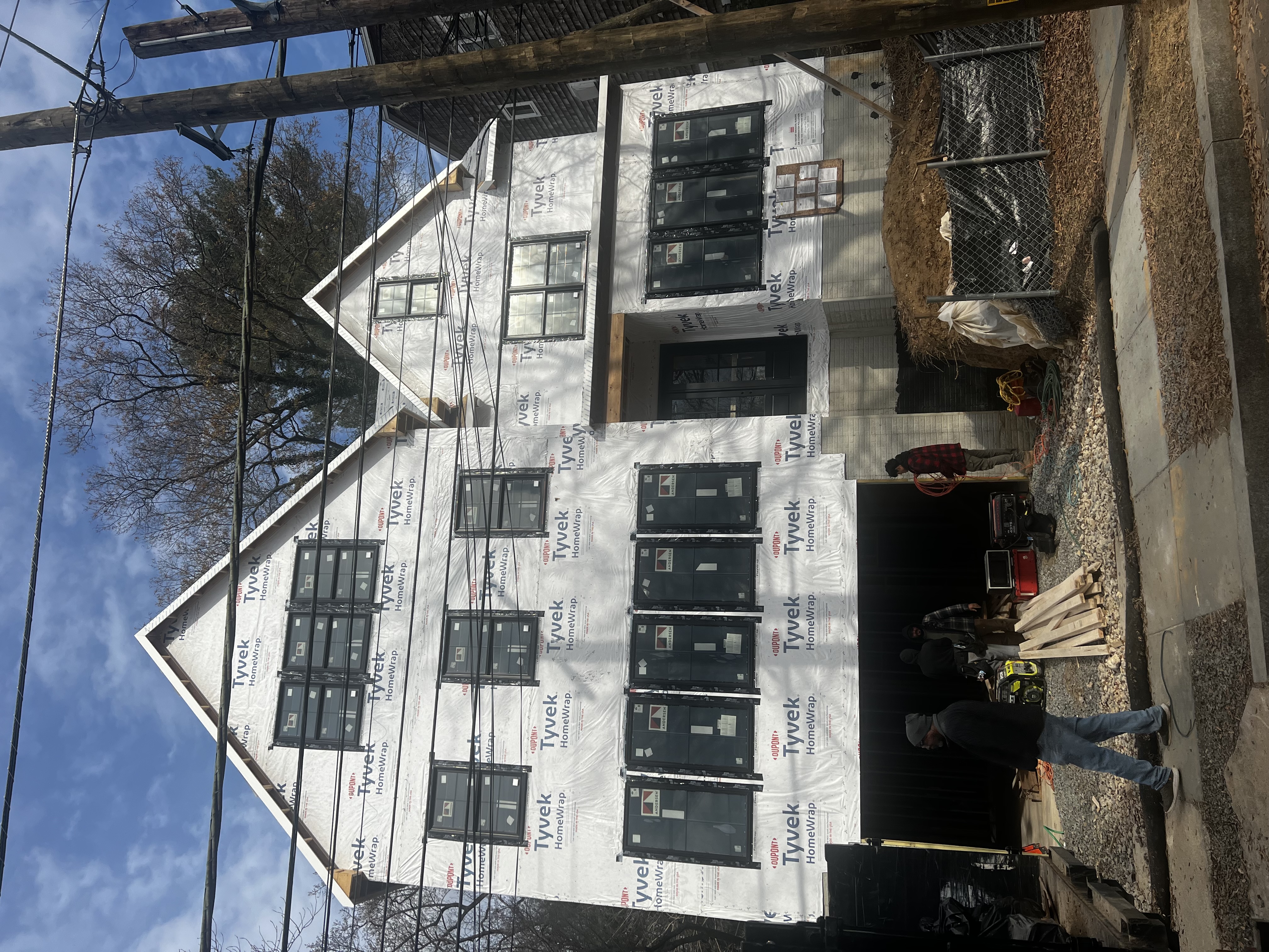 BHI Construction custom home under construction Washington DC Tyvek wrap framing