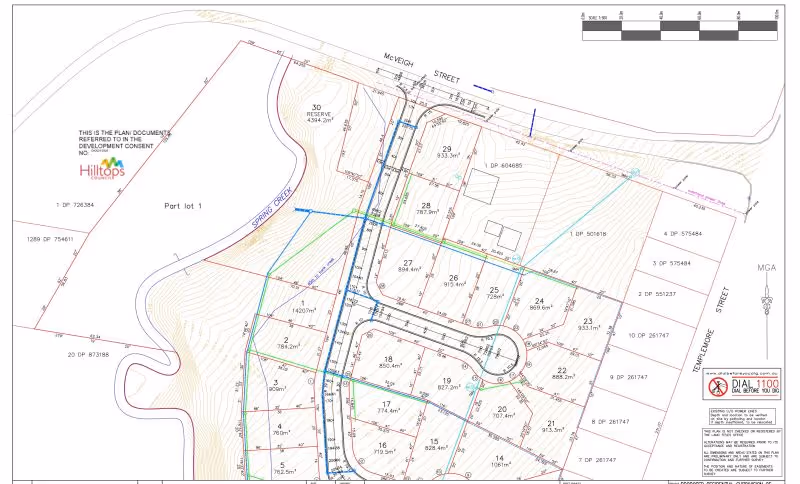 Detailed site plan map showing lot divisions, street layout, and measurements for a residential development on McVeigh Street, including labeled lot numbers and dimensions.