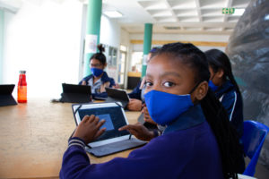 Student using an Android tablet for distance learning