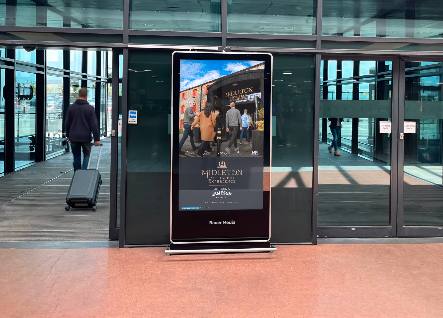 An digital advertising screen in the arrivals hall of Shannon Airport