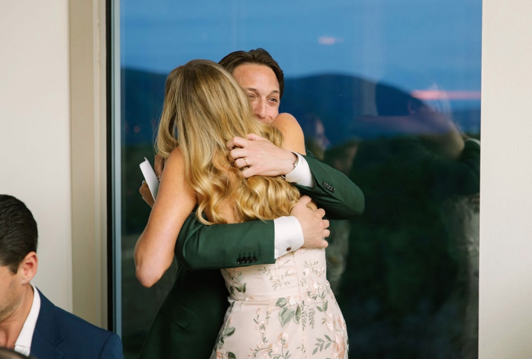 Emma hugging her brother