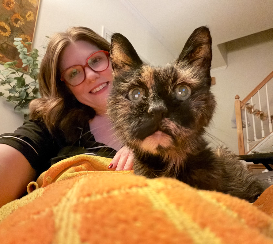 Wokka cat with owner