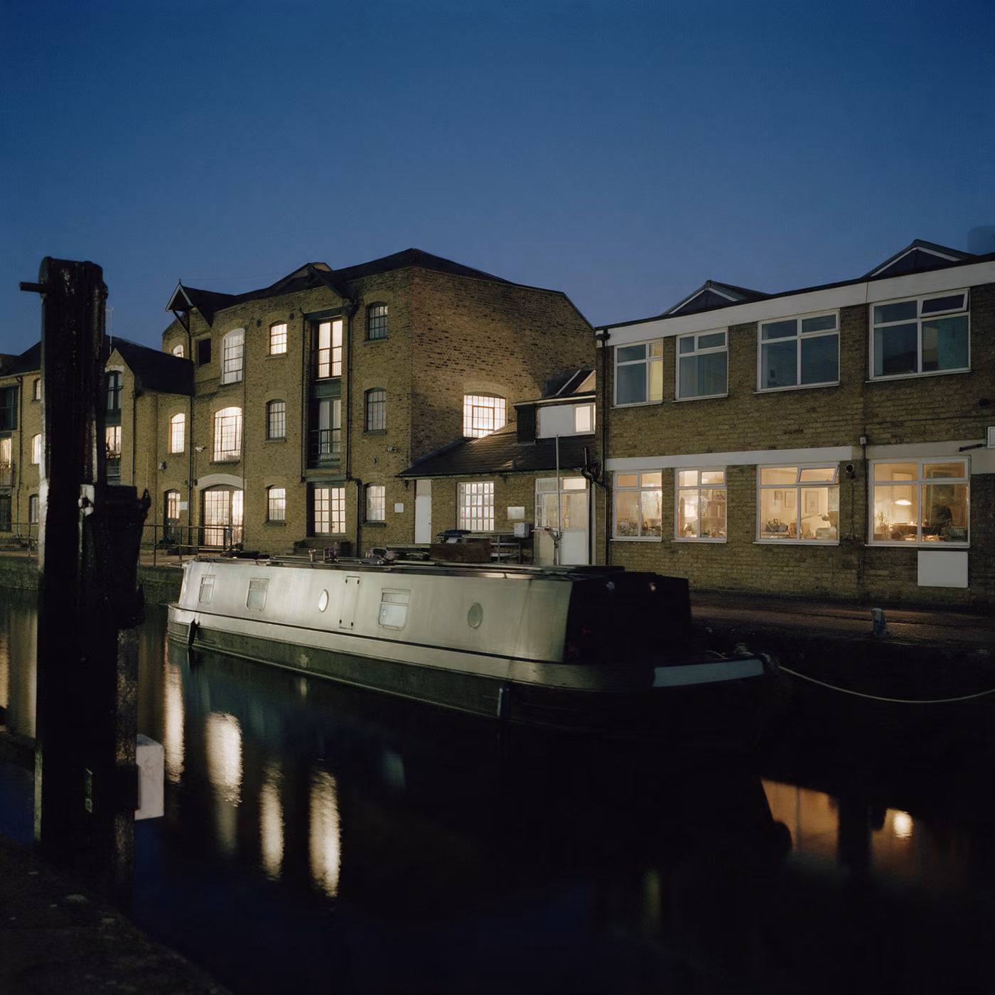 Warehouse offices beside Regent's Canal in Camden at dusk