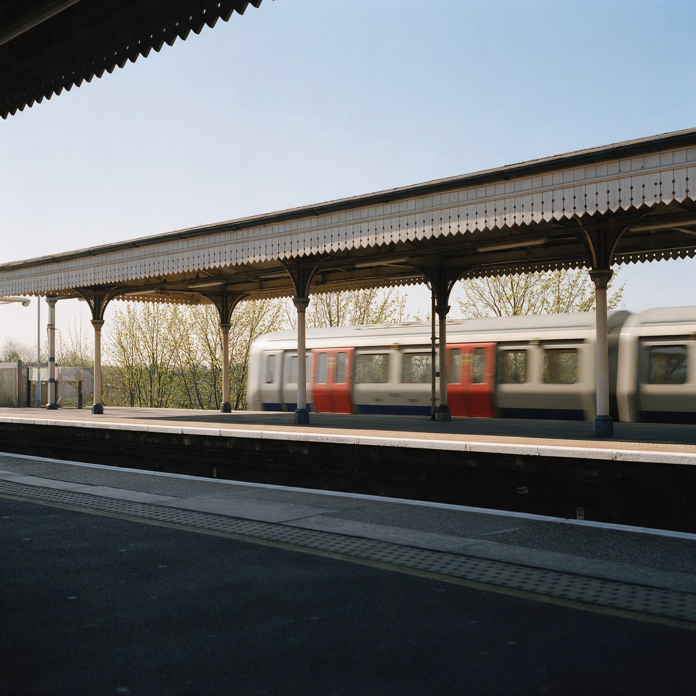 IT support North London: a suburban railway platform with a Victorian canopy