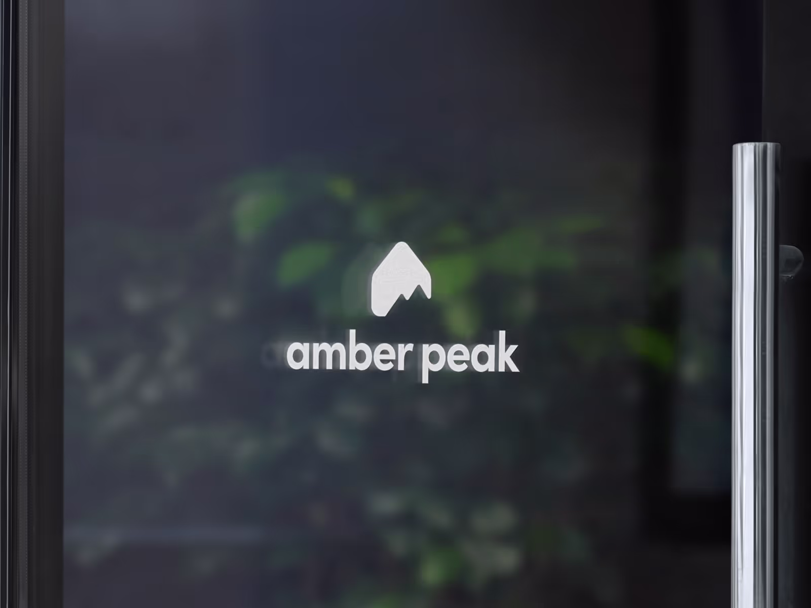Amber peak logo on a glass door