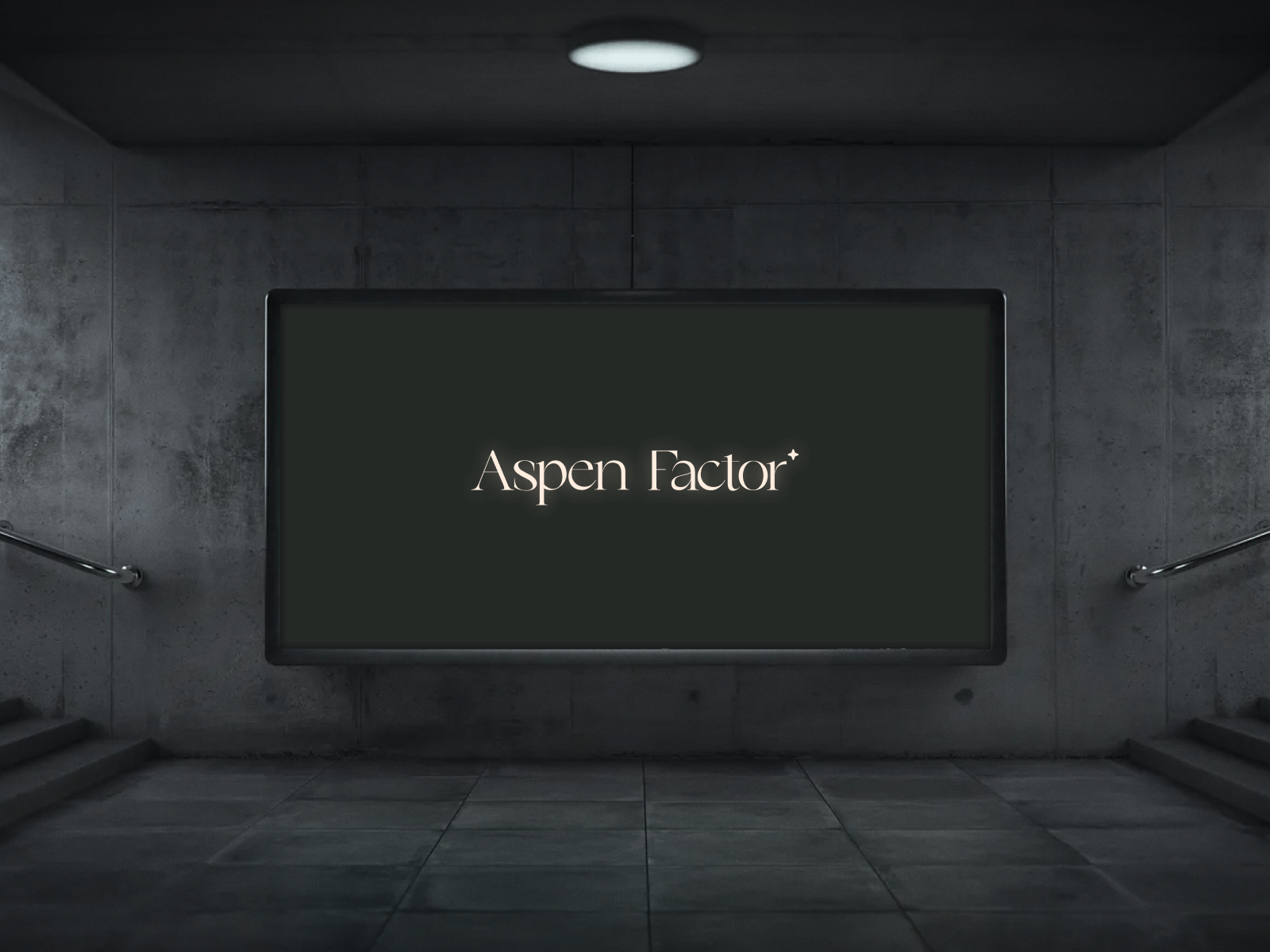A big screen with the Aspen Factor logo in an underground location