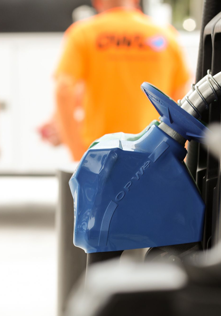 Electronic door lock on beige wall with floating translucent hexagonal icons representing security, location, users, and data.