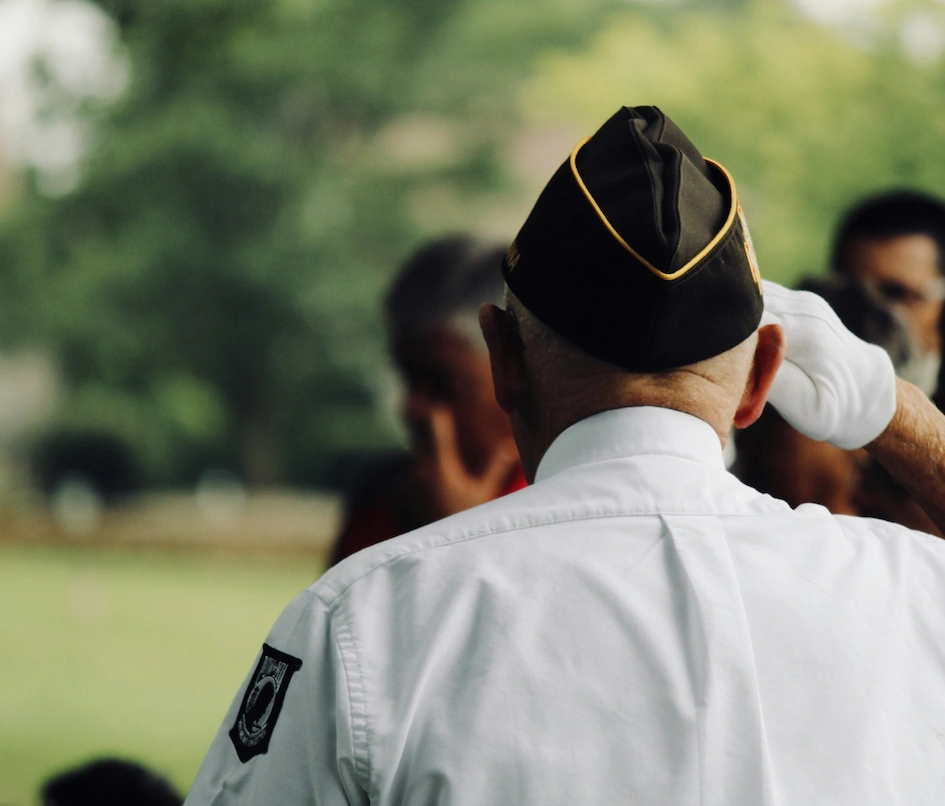 Veteran speaking with a healthcare professional alongside a family member