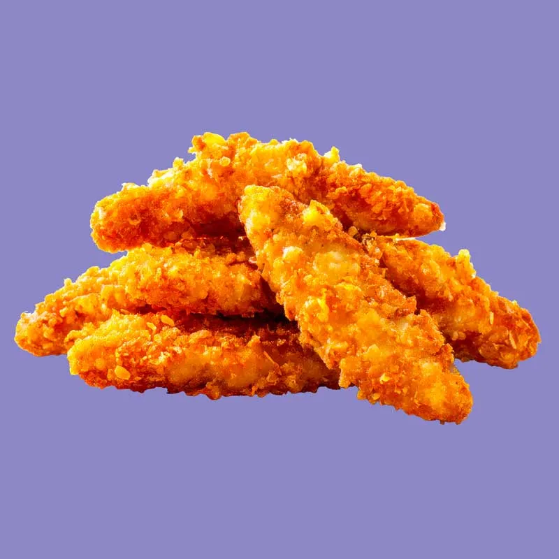 A stack of golden-brown chicken nuggets arranged neatly on top of each other.