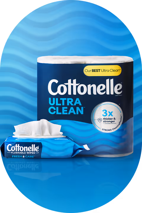 Cottonelle Ultra Clean toilet paper roll and a pack of Cottonelle Flushable Wipes Fresh Care on a blue surface with a wavy blue background.