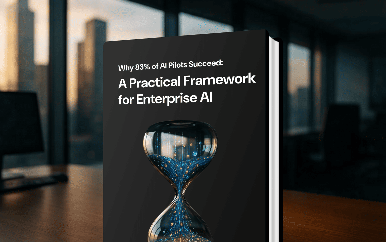 Book cover mockup: dark minimalist design titled "Why 83% of AI Pilots Succeed: A Practical Framework for Enterprise AI," featuring an hourglass of flowing blue data over a sunset office.