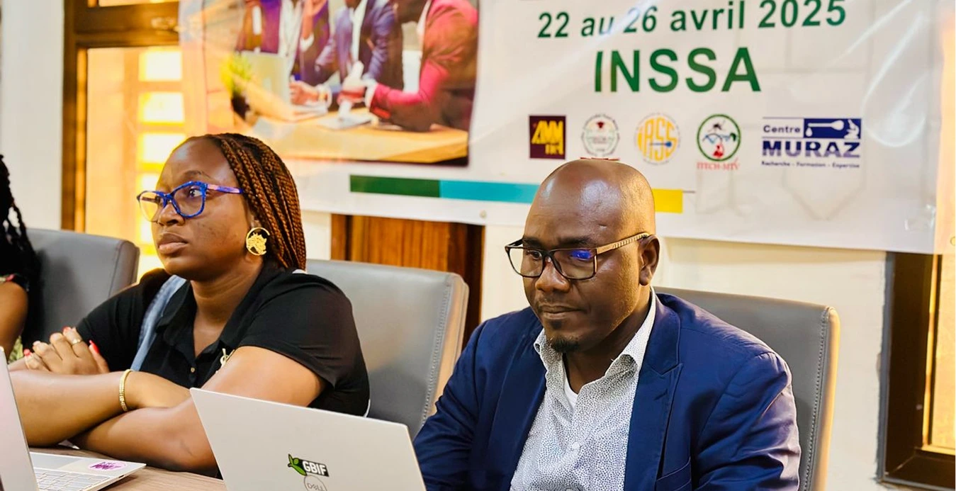 a man and woman sitting at a table