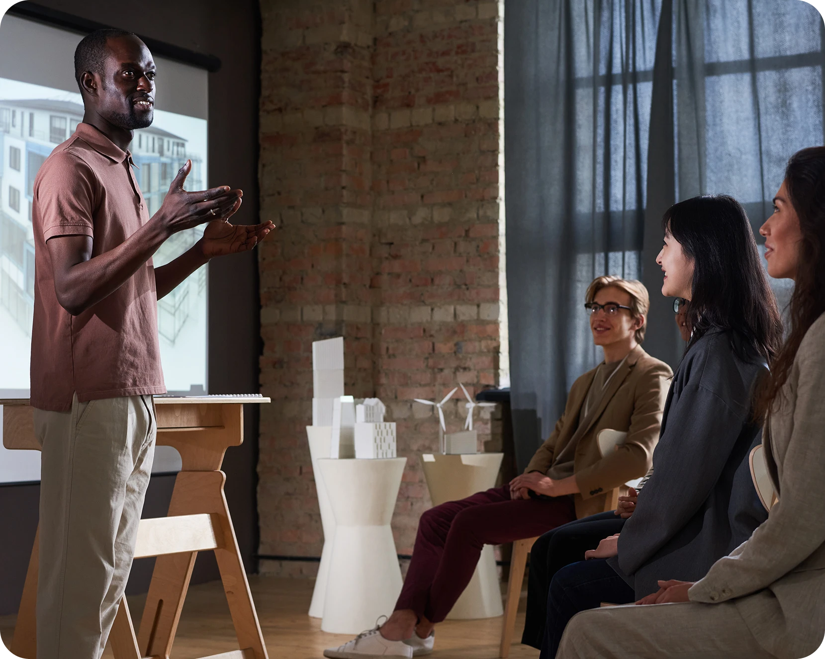 a man standing in front of a group of people