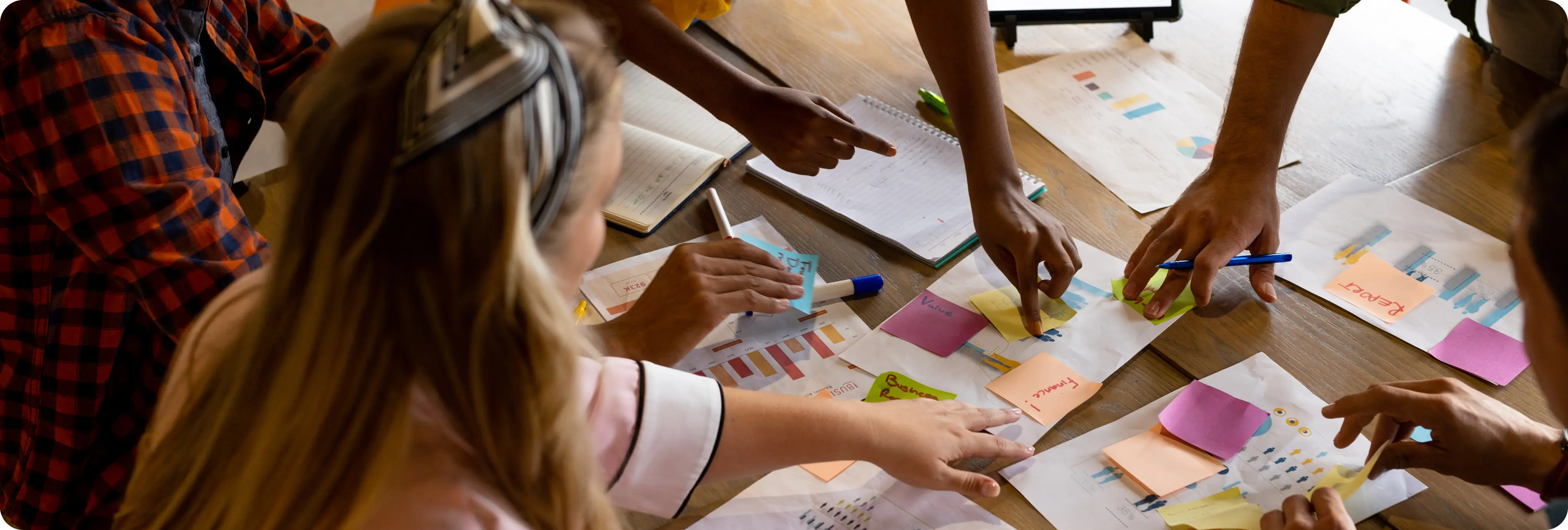 a group of people working on a table