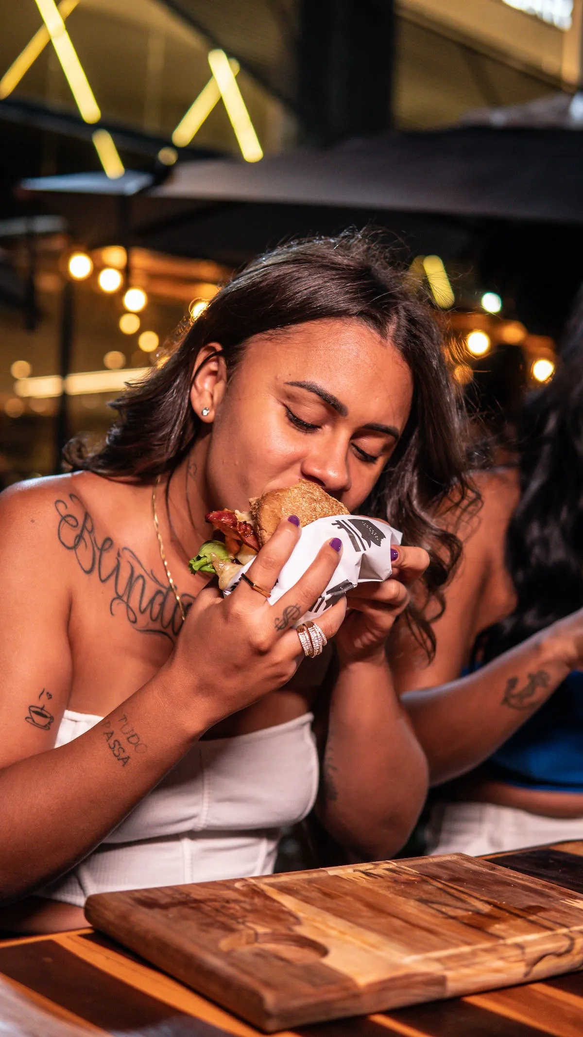 A customer eating a burger