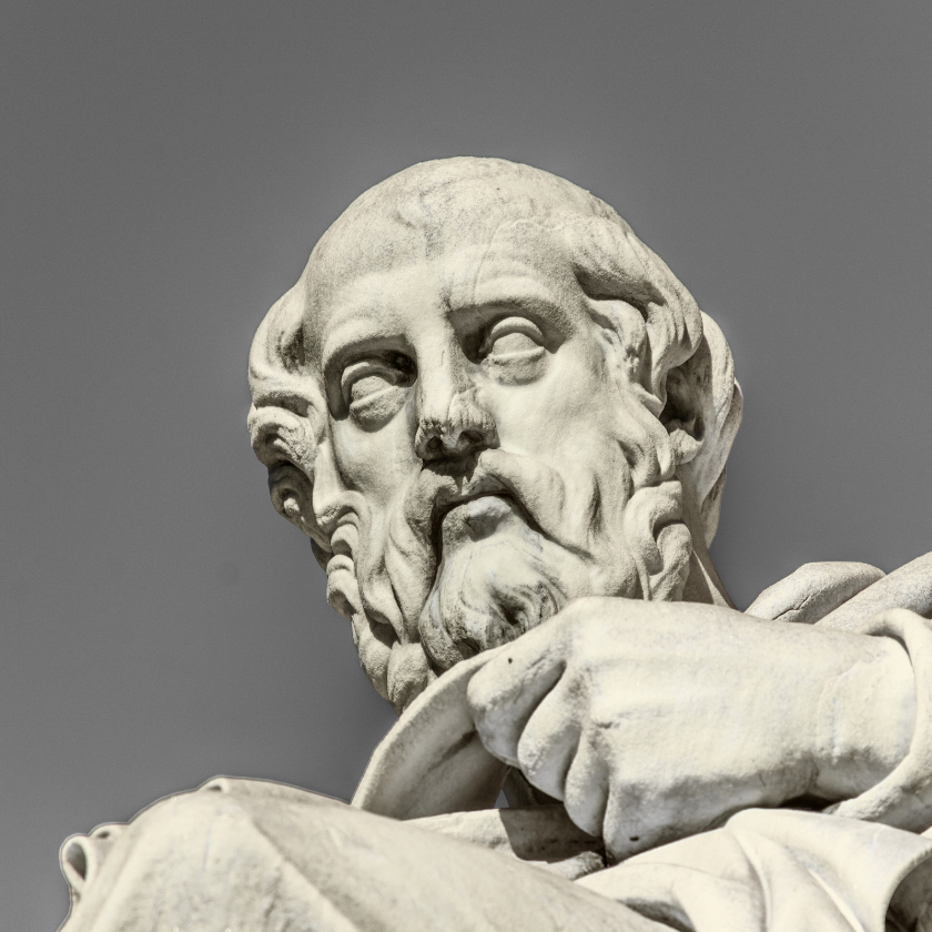 White sparkle shape in the center with a textured black and gray grainy background.