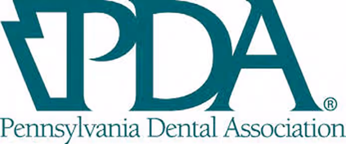 Logo of the Pennsylvania Dental Association with the acronym PDA in bold green letters.