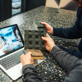 Material and finish samples prepared for display unit design.