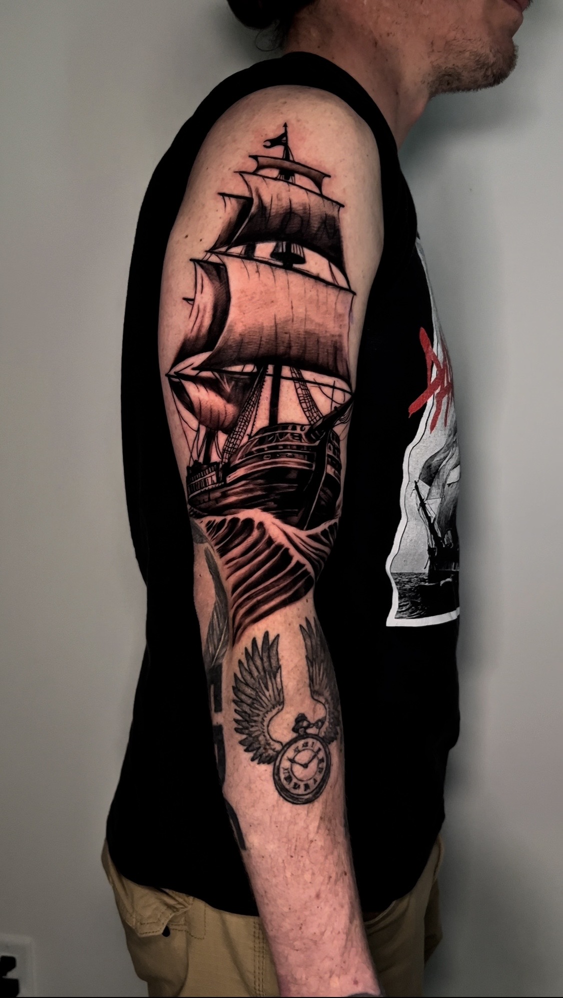 Realism Boat and Wave Tattoo