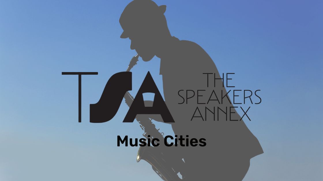 Silhouette of a man playing saxophone against a clear blue sky, with TSA The Speakers Annex logo and text 'Music Cities'.