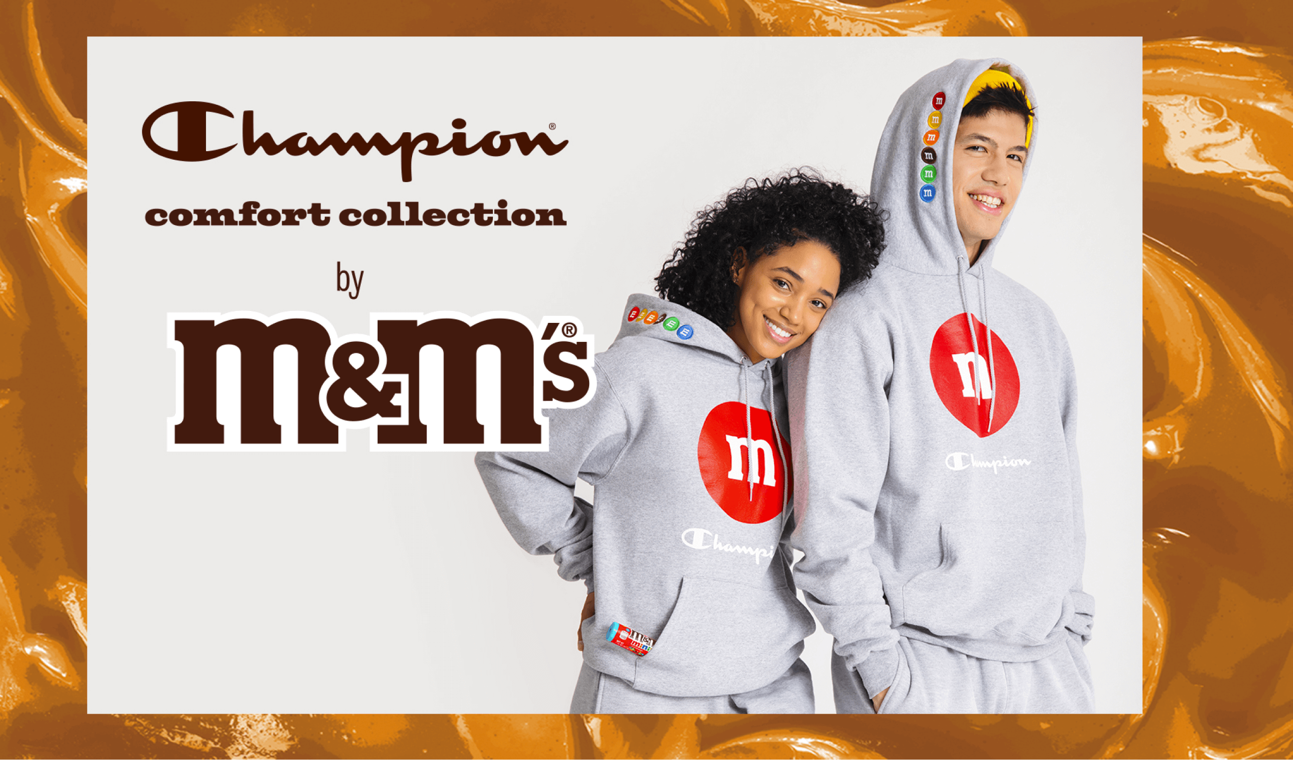 Luke Embers posing with another model for the Champion x M&M collaboration.
