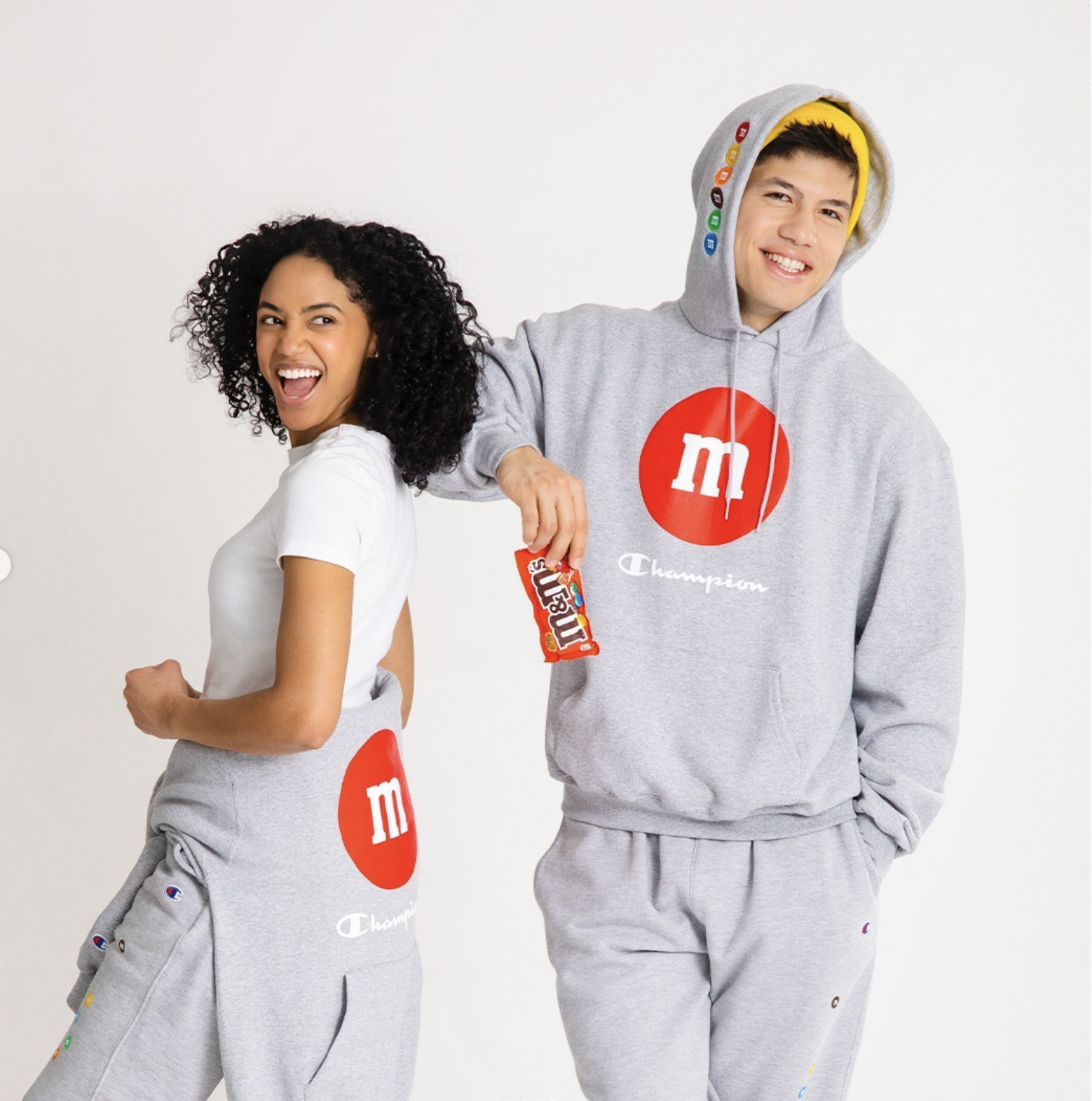 Luke Embers having fun with another model for the Champion x M&M collaboration.