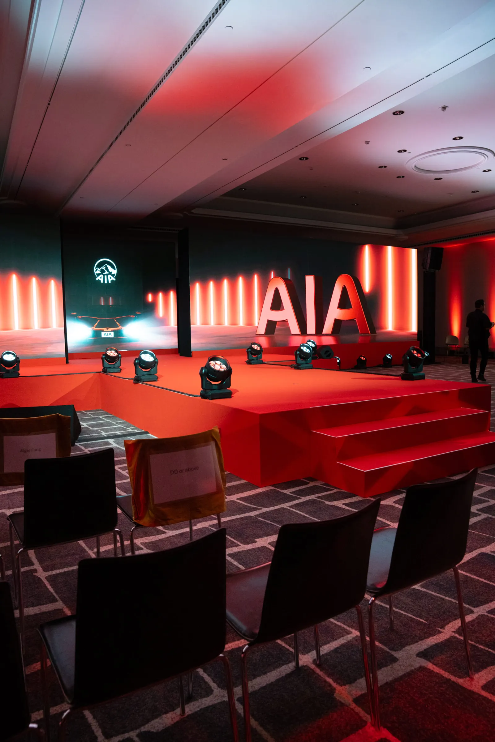 Plenary stage with LED wall and red scenography, Hotel Arts Barcelona
