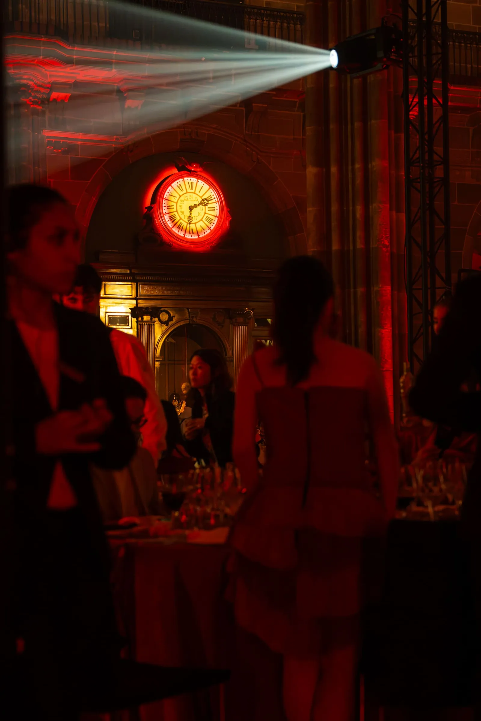 Lighting design with beams and red wash during the gala dinner at La Llotja de Mar