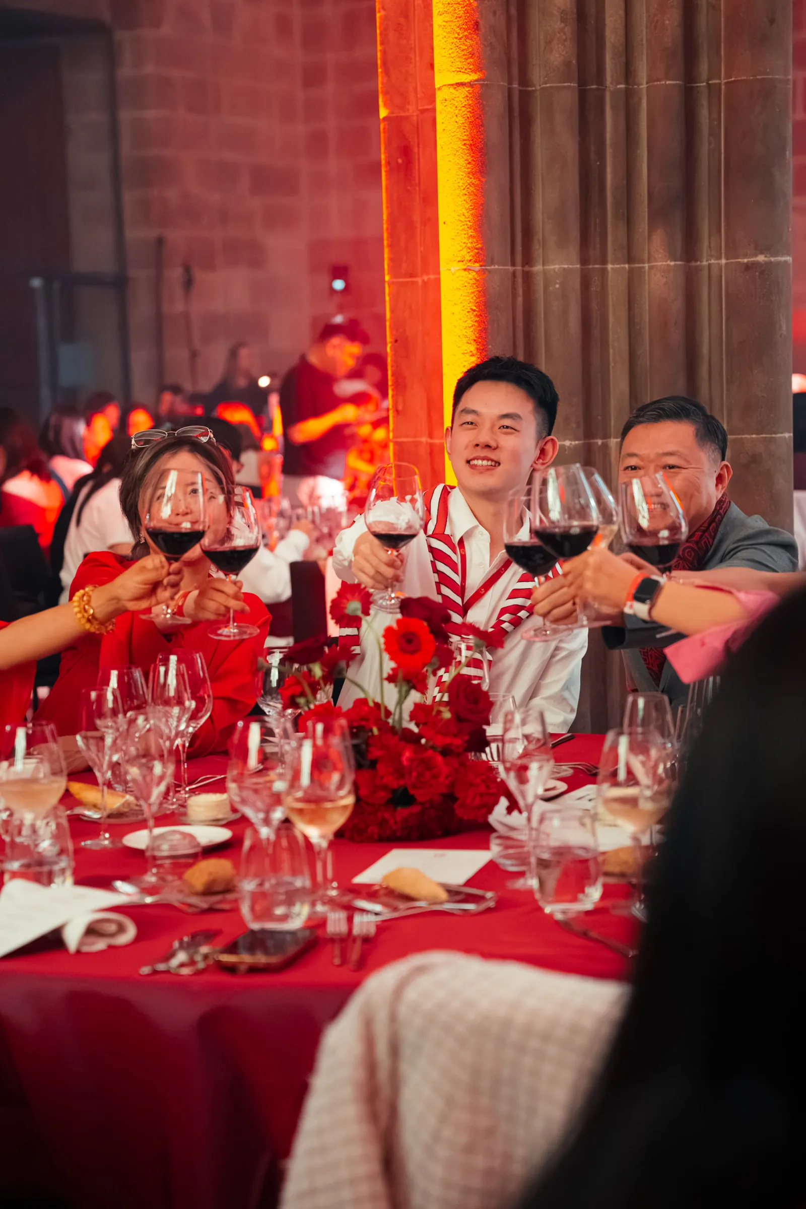Guests toasting at the corporate gala dinner in La Llotja de Mar, Barcelona