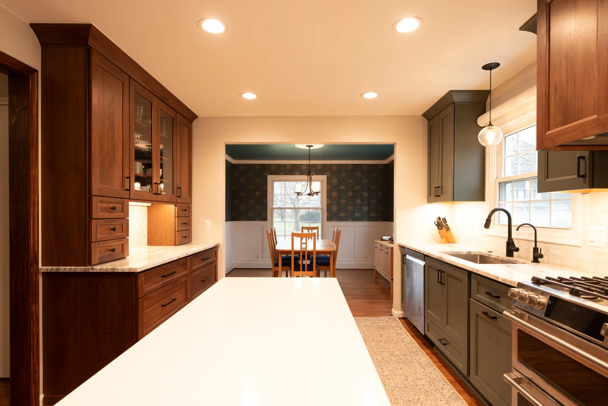 Modern kitchen with wooden cabinets and white island