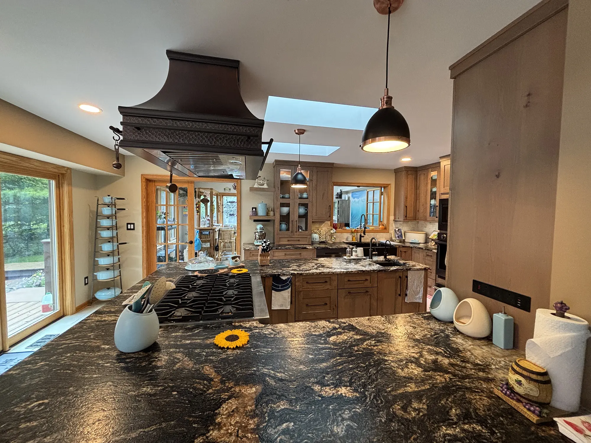 Modern kitchen with dark granite countertops