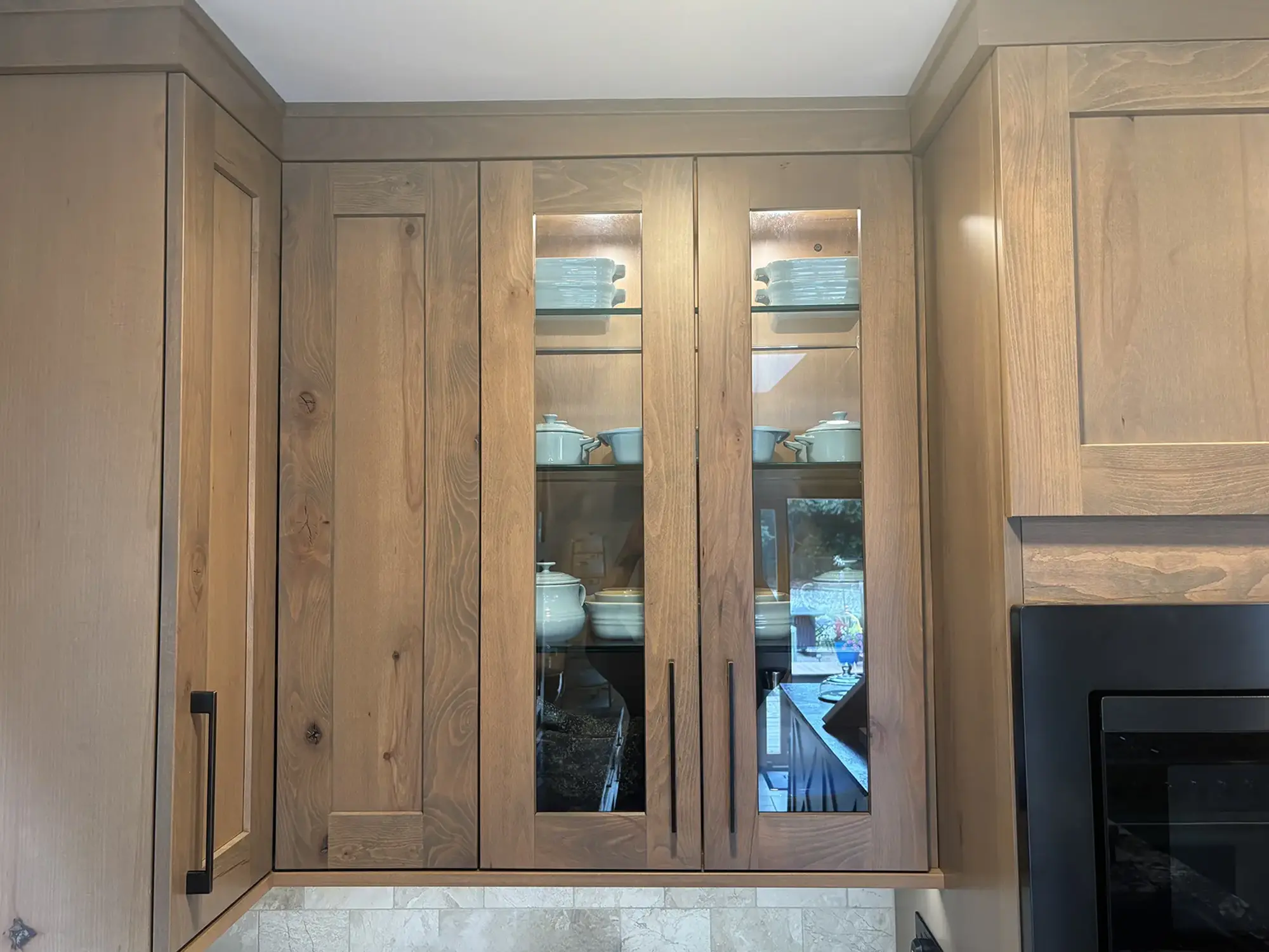 Wooden kitchen cabinets with glass doors