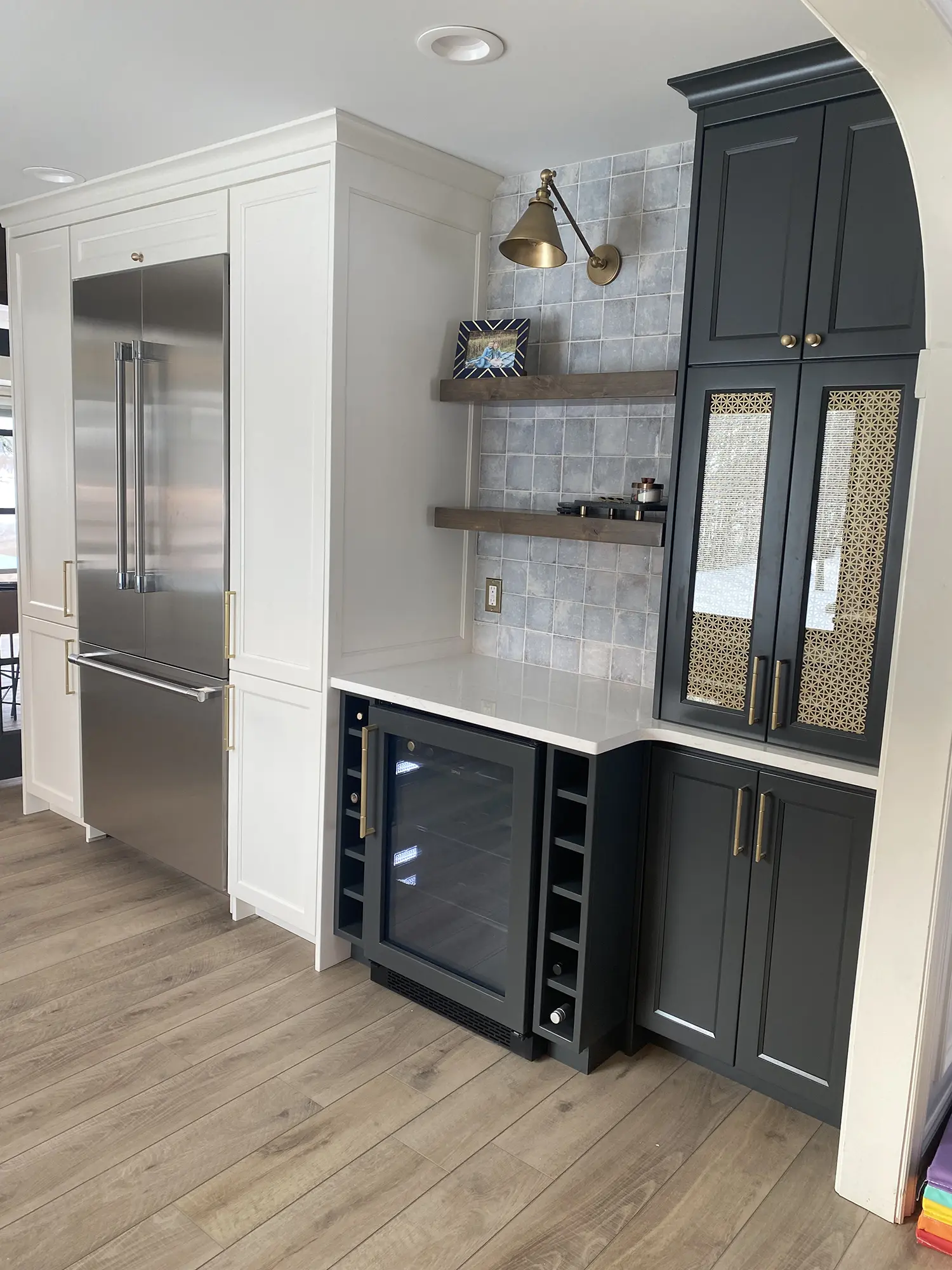 Kitchen corner with white and dark cabinets